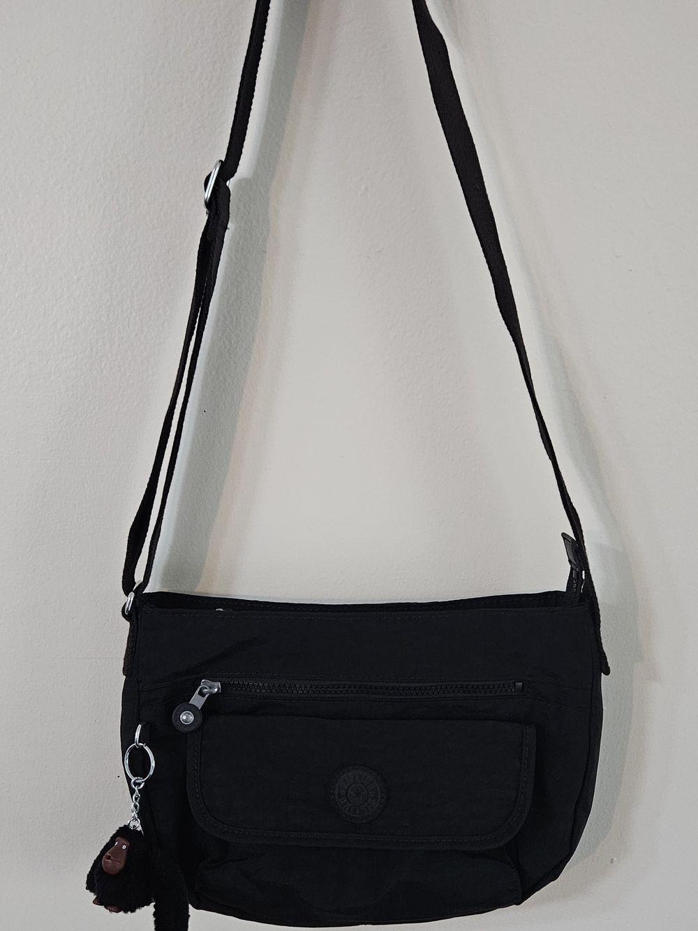 Kipling Black Crossbody Bag with Monkey Chain.